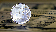 Рубль растет к доллару