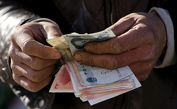 Китайцам заплатят за отказ от денег ради цифрового юаня