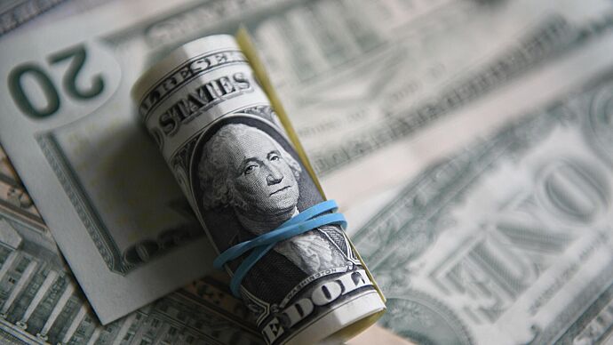 Курс доллара на Мосбирже вырос до 91,36 рубля