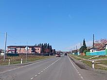 В поселке Красноярского края на год раньше отремонтировали три участка дороги