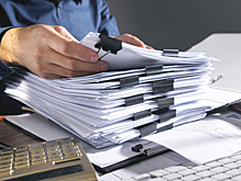 Как совмещать обязанности на работе и сколько вам заплатят