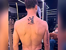 "Стойкий мужик": Португальский футболист "Ман Сити" сделал татуировку на русском