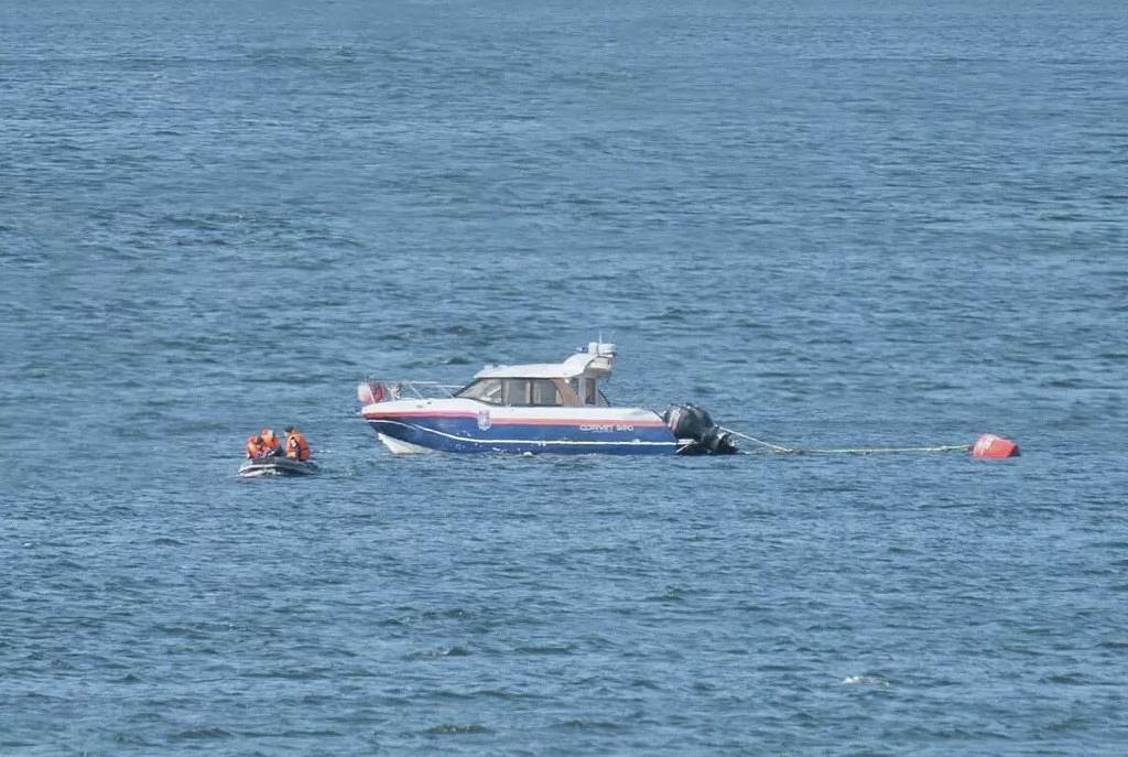 Уплывших в открытое море рыбаков и собаку спасли в России