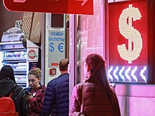 Курс доллара снизился до 62,7 рубля