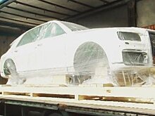 Шпионы сфотографировали разобранный Aurus Senat на погрузчике