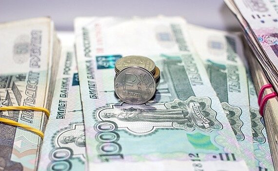 Средневзвешенный курс доллара на 11:30 мск вырос до 66,63 рубля