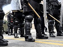 Адвокаты полицейских в Балтиморе требуют отстранения прокурора