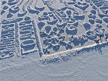 Жители Тынды нарисовали рекордных размеров ледовую открытку