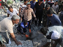 После попадания ракеты в женскую школу в Минабе погибли 148 человек