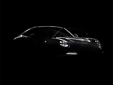 Porsche опубликовала первый тизер нового 911 с надписью «desi911»
