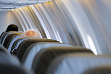 Названы самые опасные при пандемии места в самолете