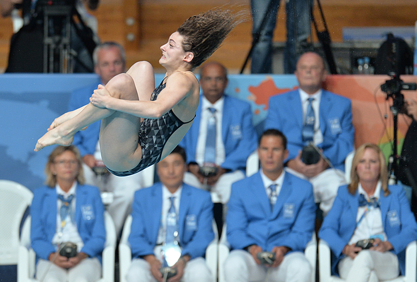 Мэддисон Кини (Австралия) в соревнованиях по прыжкам в воду с трамплина 1 м среди женщин