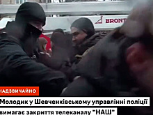 Украинские националисты в прямом эфире избили журналиста телеканала «Наш»
