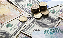 Доллар и евро подорожали к рублю по итогам основной валютной сессии