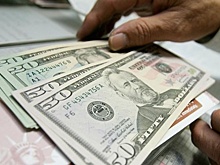 Почему курс доллара США впервые за месяц превысил 67 рублей
