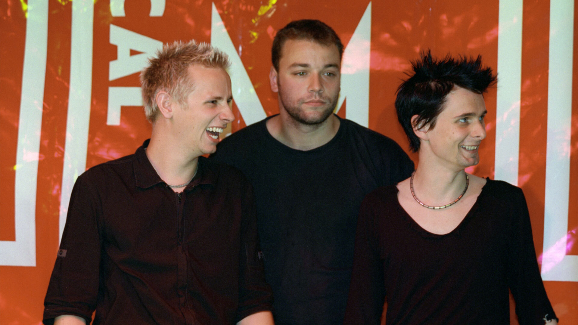 Группа Muse (Доминик Ховард, Крис Уолстенхолм, Мэттью Беллами) во время гастролей в Москве, 22 сентября 2001 года