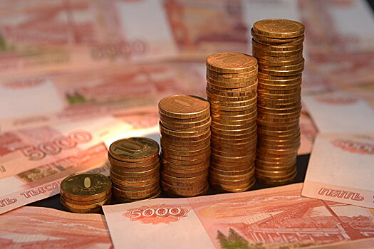 Рубль растет к доллару