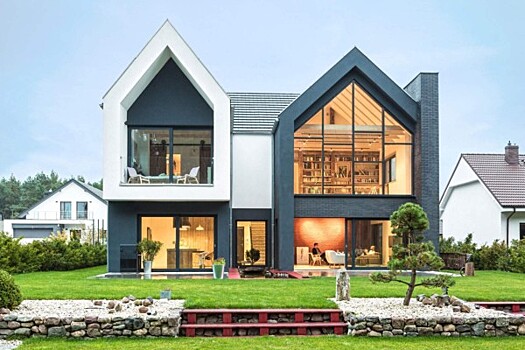 Современный дом с асимметричным фасадом и оригинальными интерьерами