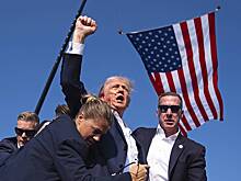 Покушение на Дональда Трампа: самые яркие кадры нападения на главного кандидата в президенты США