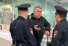Задержание заслуженного тренера России из-за маски попало на видео