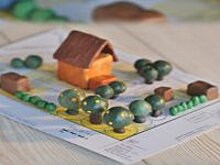 Кому компенсируют издержки за оспаривание кадастровой оценки