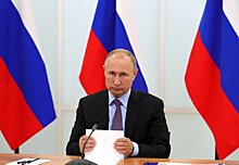 Путин приехал на избирательный участок