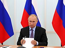 Путин приехал на избирательный участок