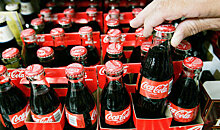 Moody's ухудшило прогноз по рейтингам Coca-Cola