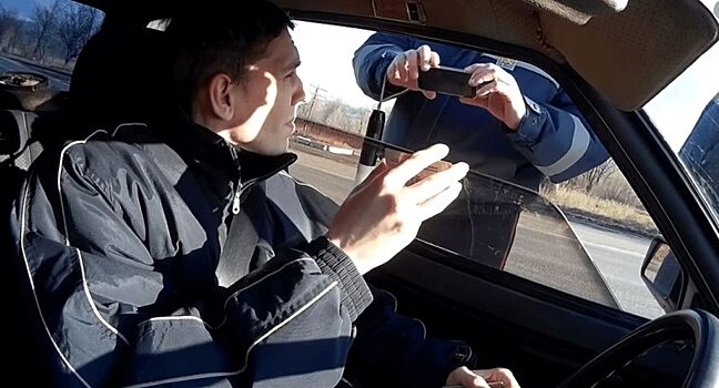 Инспектор ГИБДД сфотографировал права. Законно ли это?