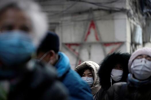 Число жертв коронавируса в КНР выросло