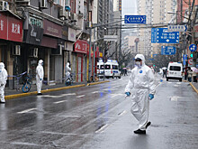 Миллионы китайцев оказались заперты в своих квартирах из-за новой волны COVID-19