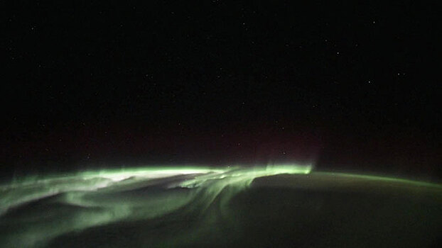 Космонавт снял с борта МКС полярное сияние