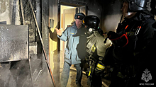 Более 20 спасателей тушили пожар в многоэтажке в Новокузнецке