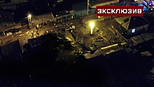 Место падения Су-30 на жилой дом в Иркутске сняли с помощью дрона