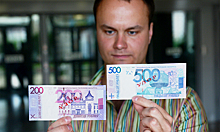Экономист оценил решение отложить введение единой валюты РФ и Белоруссии
