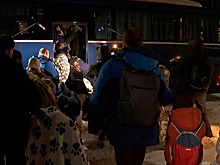 Российских детей доставили из Сирии в Москву