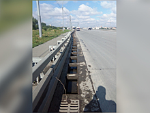 И тут воруют: власти рассказали, когда на обочинах Бугринского моста исчезнут дыры