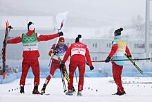 Сергей Устюгов финишировал в олимпийской эстафете с флагом в руках