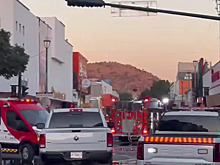 В результате пожара в универмаге погибли по меньшей мере 23 человека