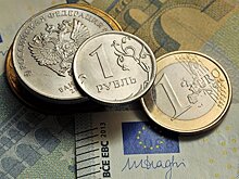 Рубль повышается к доллару и к евро