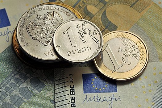 Рубль повышается к доллару и к евро