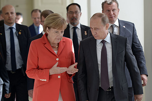 Путин может поговорить с Меркель в Париже