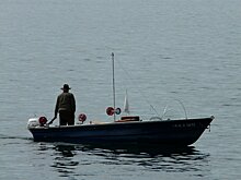 Рыбина отняла удочку у рыбачки