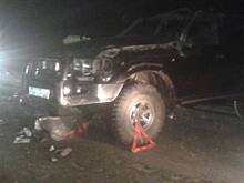 На загородной трассе приморца придавило собственным автомобилем