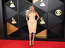 Хайди Клум вышла в свет в латексном платье