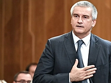 Путин наградил Аксенова орденом