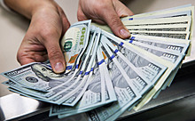 Курс доллара на открытии торгов Мосбиржи повысился до 92 рублей