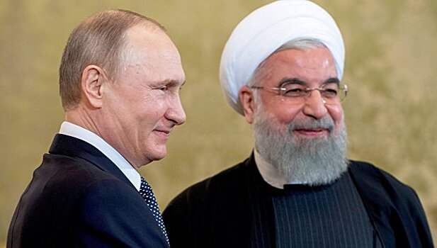 Путин поздравил Рухани с переизбранием