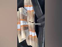 Российский экс-военком похвастался пистолетом и «полным портфелем бабла» и попал на видео