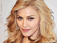 Мадонна снялась для обложки Vogue с обнаженной грудью